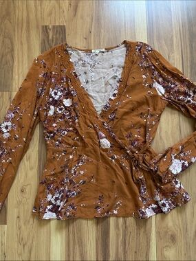 Maurices Rust and White Floral Wrap Blouse